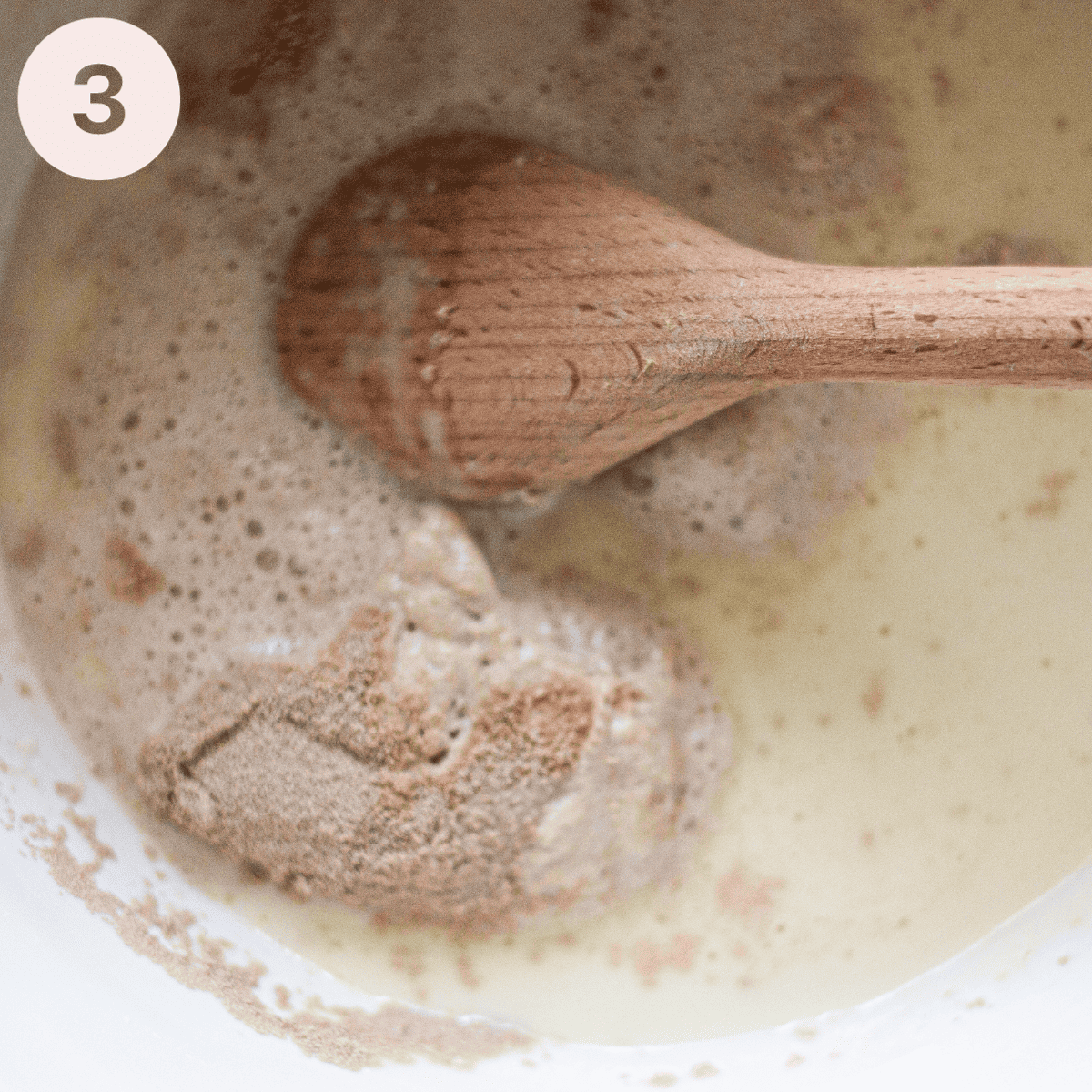 Adding activated yeast to yogurt and butter.