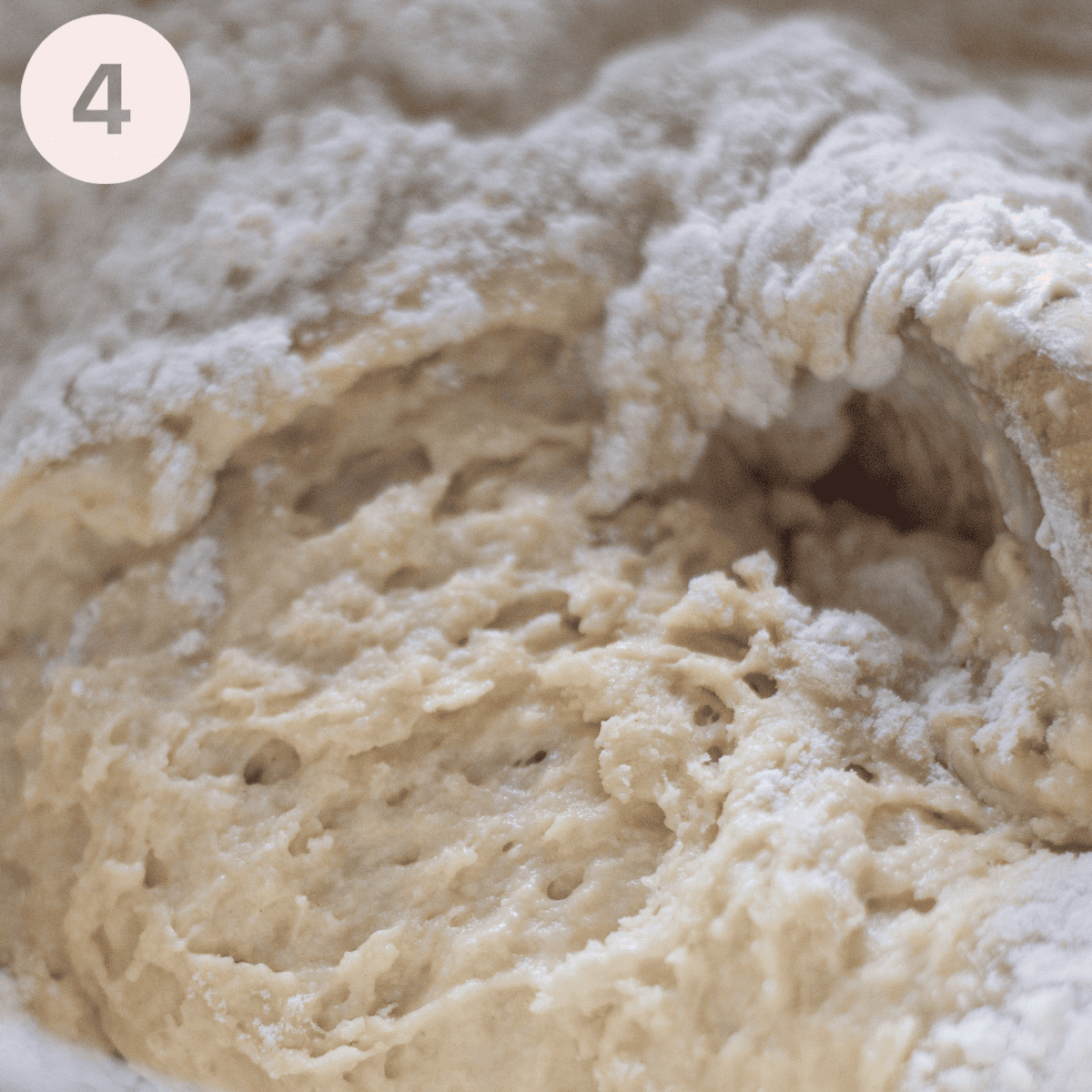 Adding flour to the yeast yogurt mixture.
